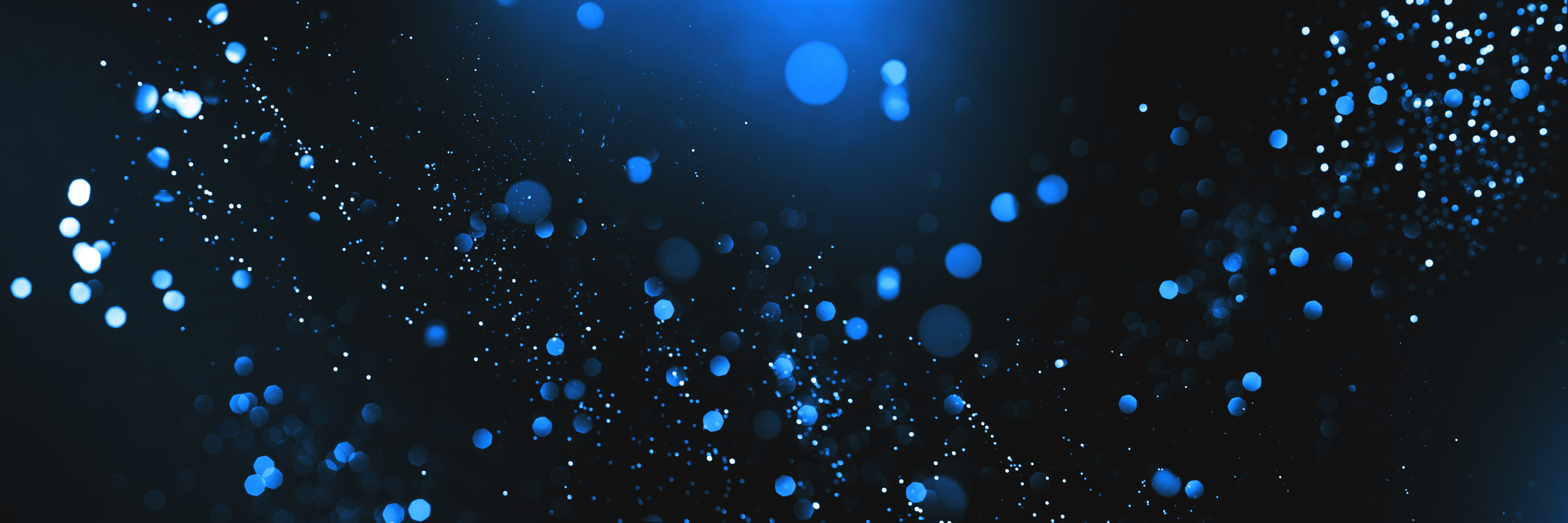 Abstract Bokeh on Dark Blue Background
